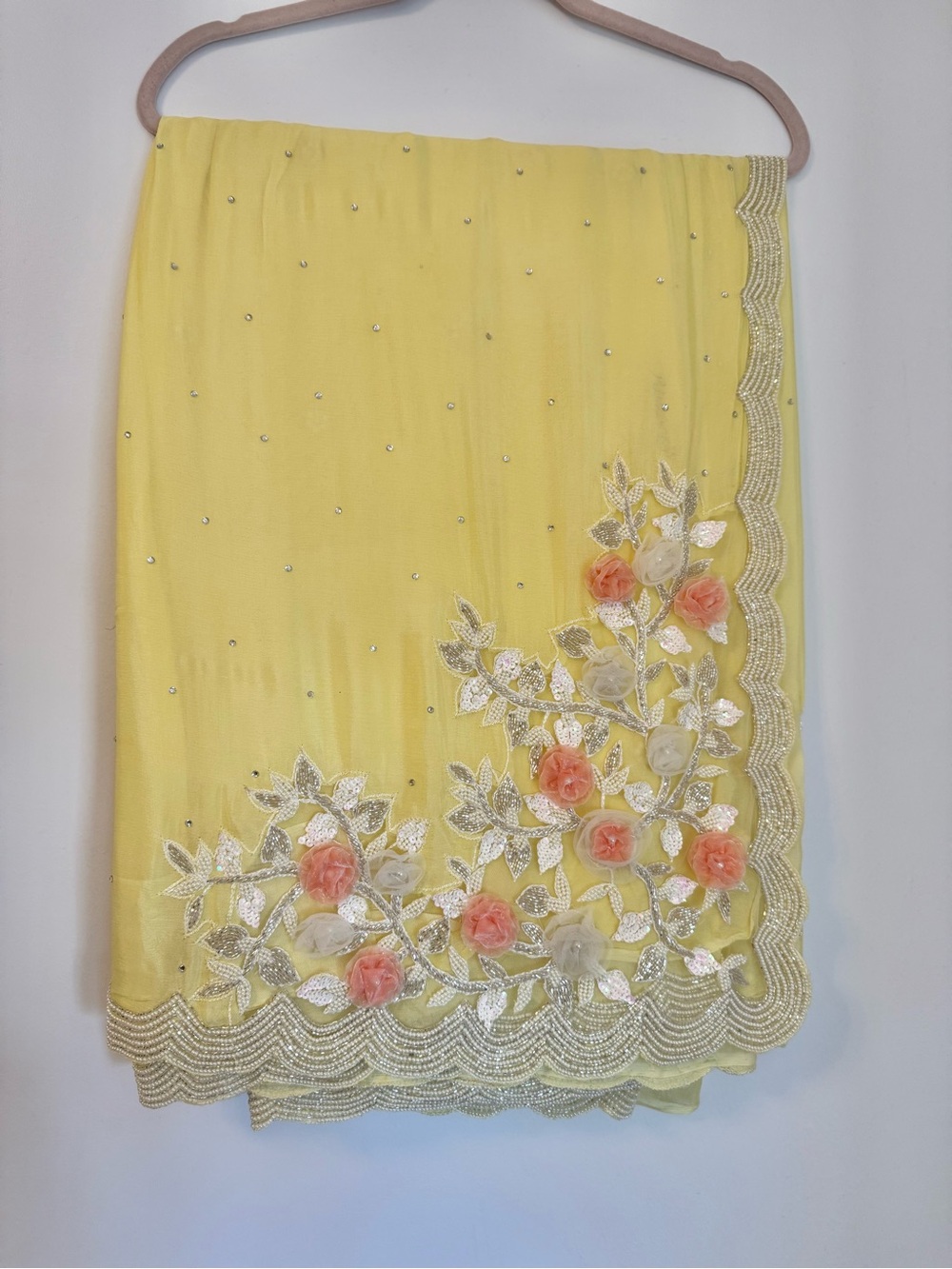 Light yellow floral chiffon saree with Bead work.